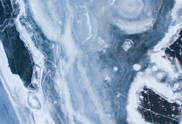 Patterns on frozen ice; cover image for blog on how to build achievement and motivation at work